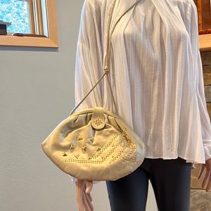 Vintage gold cross body clutch with metallic detail